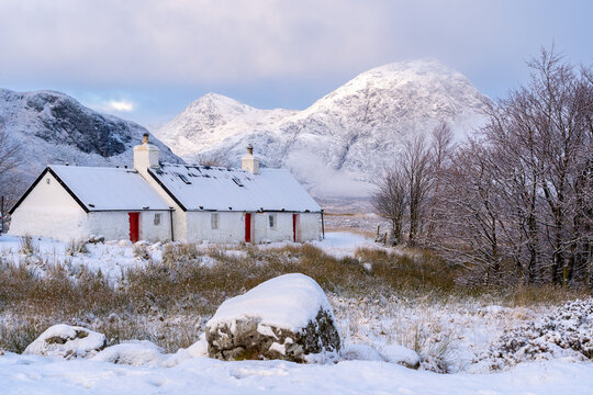 Blackrock Cottage in the snow, Glencoe, Scottish Highlands, Scotland
