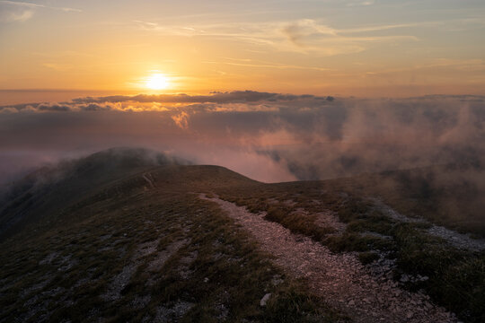 Monte Nerone at sunset on a foggy day, Apennines, Marche, Italy