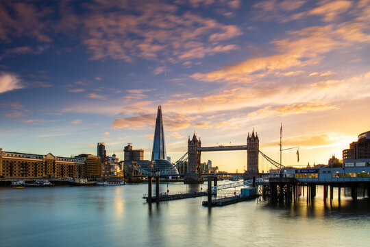 Tower Bridge, Butler's Wharf and The Shard at sunset taken from Wapping, London, England