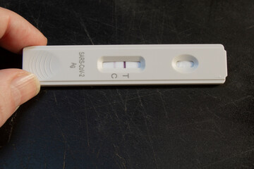 Positive diagnostic test result at SARS-CoV-2 (Covid-19) coronavirus pandemic.Concept for omicron variant, corona virus