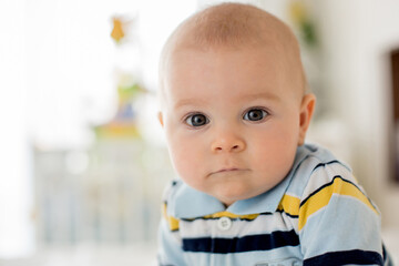 Portrait of a cute  infant baby boy. Happy childhood concept.