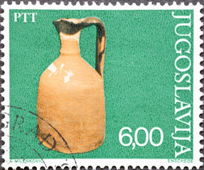 Yugoslavia - circa 1976 : a postage stamp from Yugoslavia, showing a handmade clay product....