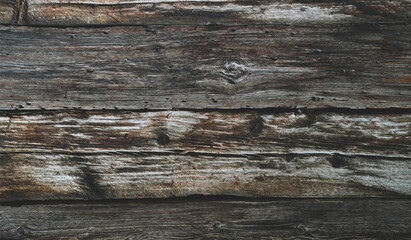 Weathered old wooden vintage barn wood. Timber wood wall texture background. Used as natural background. Vintage toned. Empty template.