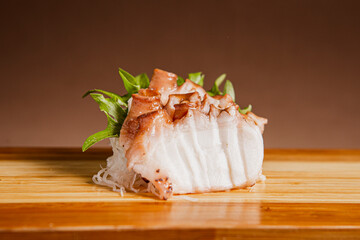 Tako nigiri sushi or octopus sushi isolated on a tradicional ceramic plate background, Japanese food. Copy space.