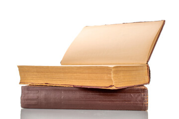 Two old books, macro shot, isolated on a white background.