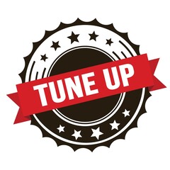 TUNE UP text on red brown ribbon stamp.