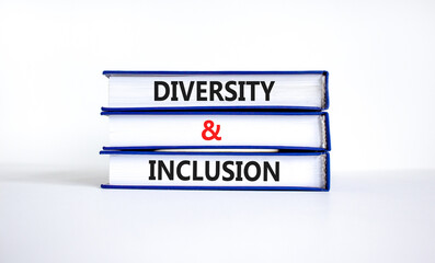 D and I, Diversity and inclusion symbol. Concept words D and I, diversity and inclusion on books on beautiful white table white background. Business, D and I, diversity and inclusion concept.