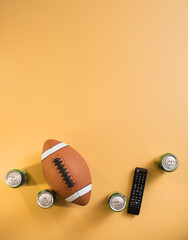 Football Watch Party Background with Soda Cans and Remote