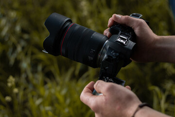 Fototapeta premium Mirrorless camera and lens being used