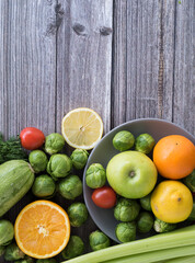 Healthy raw food for vegetarians, proper nutrition and healthy lifestyle. Flat lay on vertical banner