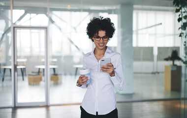 Millennial business woman use smartphone in office