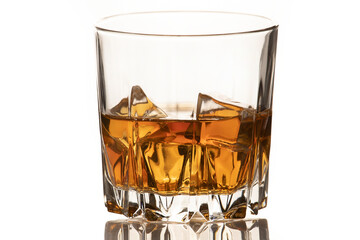 Whiskey glass with gold whiskey and cold ice isolated on a white background