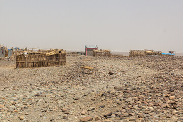 Simple huts in Hamed Ela, Afar tribe settlement in the Danakil depression, Ethiopia.