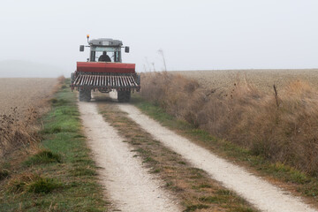 Farmer with his tractor on a rural road in the Aranguren Valley