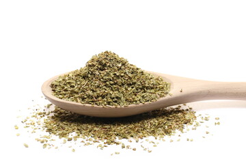 Pile of dried oregano leaves in wooden spoon isolated on white 
