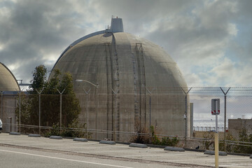 Fototapeta na wymiar nuclear power plant behind security fence