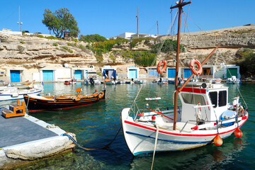 Naklejka na ściany i meble Beautiful fishermen seaside village of Mandrakia with colourful boat houses called 