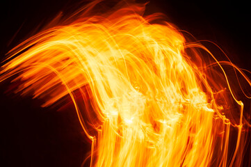 Flames of fire from a bonfire, with abstract shapes and in movement