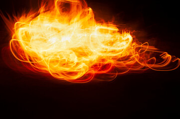 Flames of fire from a bonfire, with abstract shapes and in movement