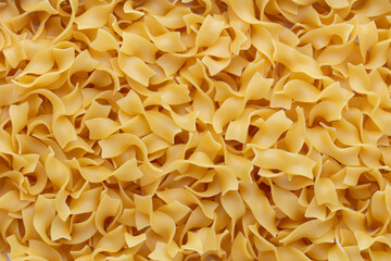 Raw pasta isolated on white background.