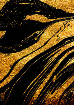 Golden swirl, artistic design. Suminagashi – the ancient art of Japanese marbling. Paper marbling is a method of aqueous surface design. Black and gold paper texture.