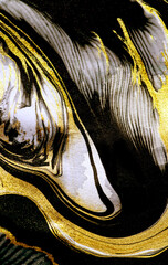 Golden swirl, artistic design. Suminagashi – the ancient art of Japanese marbling. Paper marbling...