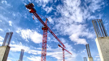 Construction site with dual cranes.  Martines Palmeiro Construction.  Plaza Fitzsimons.  12600 E Colfax Ave; Aurora, CO; USA