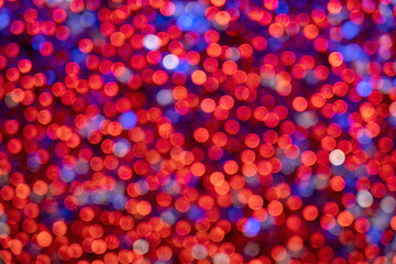 Blue and red defocused bokeh. Background. Texture.
