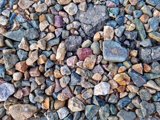 stones of different sizes and colors close-up