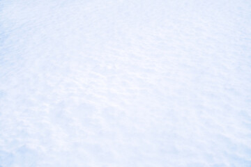 Snow surface close-up. Winter sunny day, frosty mood. Natural texture background. Copy space, place for text, top view