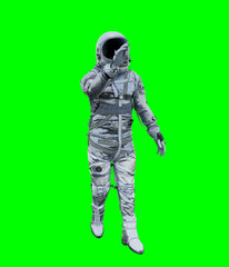 Fototapeta na wymiar Astronaut isolated on green background perfect for photo compositing