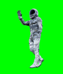 Astronaut isolated on green background perfect for photo compositing