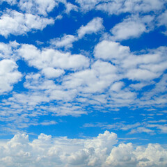 Naklejka na ściany i meble Blue sky background and clouds.