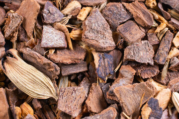 Fototapeta na wymiar Mixture of healthy herbal Organic Dry Chai Tea full frame as background. Macro.