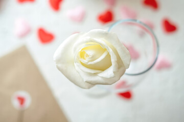 Valentines day greeting card with white rose and love envelope