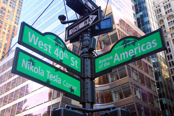 Green West 40th Street and Avenue of the Americas 6th ( Nikola Tesla corner ) Bryant Park traditional sign in Midtown Manhattan in New York City
