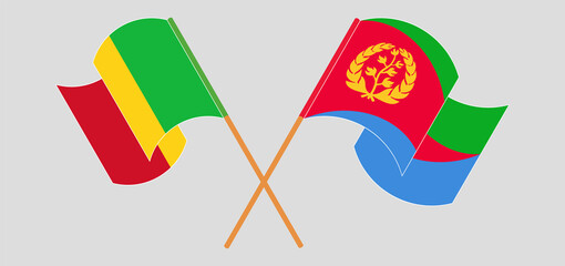 Crossed and waving flags of Mali and Eritrea