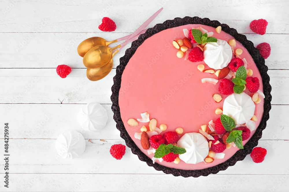 Poster gourmet raspberry chocolate pie. above view table scene on a white wood background. spring baking co