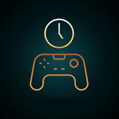 Gold line Gamepad of time icon isolated on dark blue background. Time to play games. Game controller. Vector