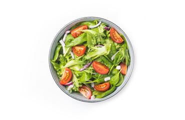 Summre green salad in white bowl plate on grey table