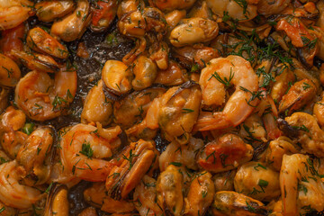 Fried prawns and mussels. grilled seafood close up