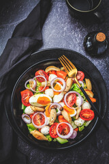 Mixed salad with roasted mushroomes, egg and mozzarella