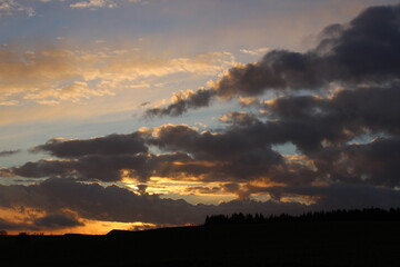 sunset over the forest, beautiful sunset in the evening