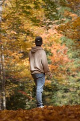 person in autumn forest