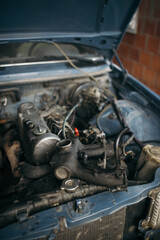 Obraz na płótnie Canvas Dirty car engine details closeup.