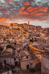 Wide view of Piazzetta Pascoli, Belvedere of Matera on the Sasso Caveoso, at sunset with a...