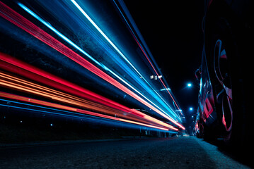 light trails of electric vehicle. sustainable transportation