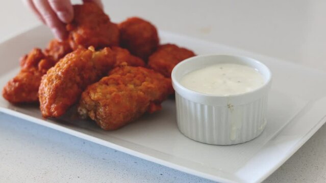 Eating Boneless Buffalo chicken  Wings