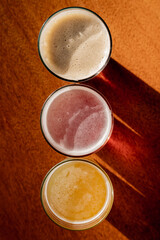 three cold craft beers in different colors