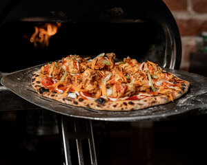 delicious and crunchy pizza with boneless on top buffalo style